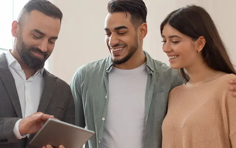 An attorney talking to two people